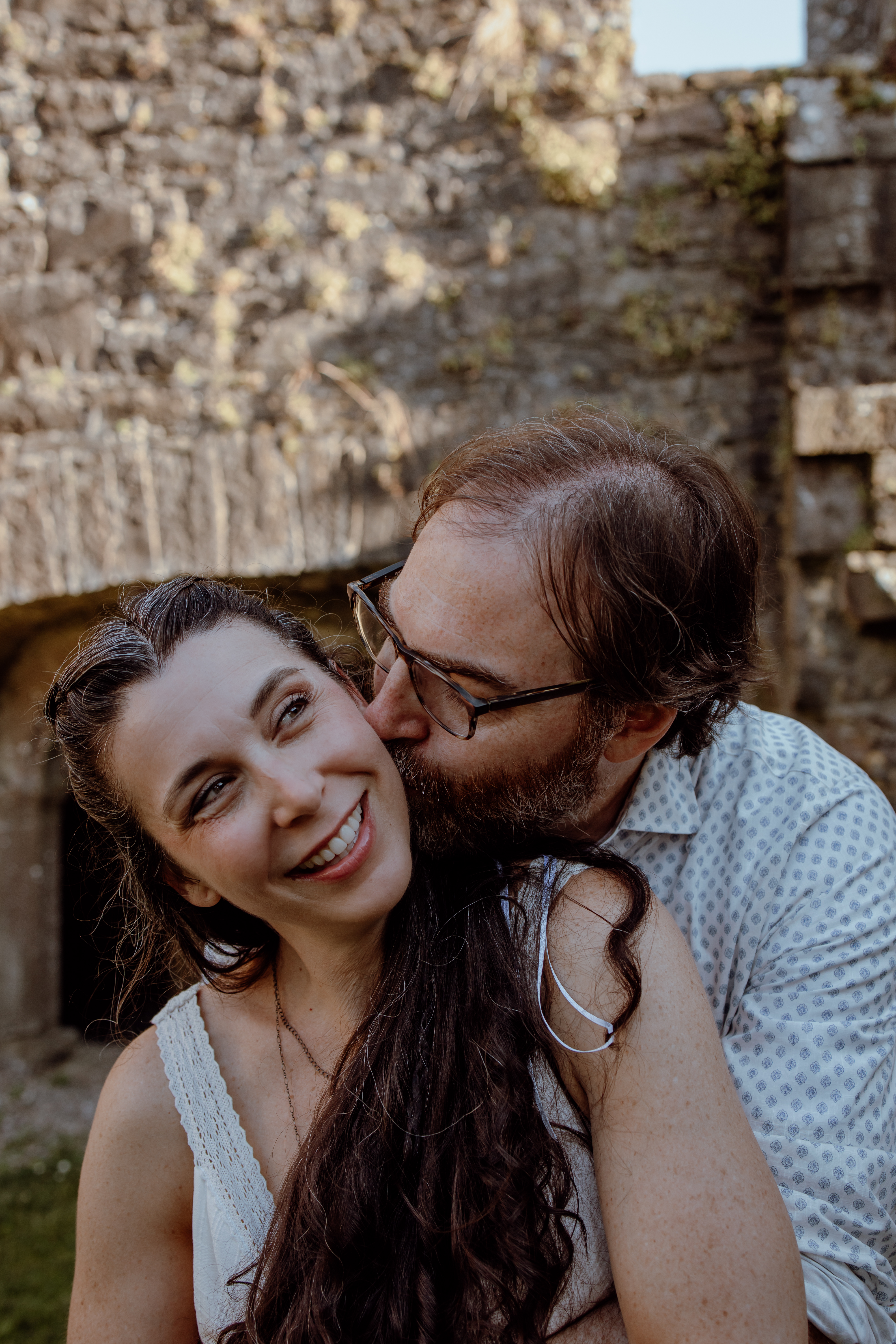 Couple enjoying a romantic photoshoot at Bactive Abbey in Ireland 