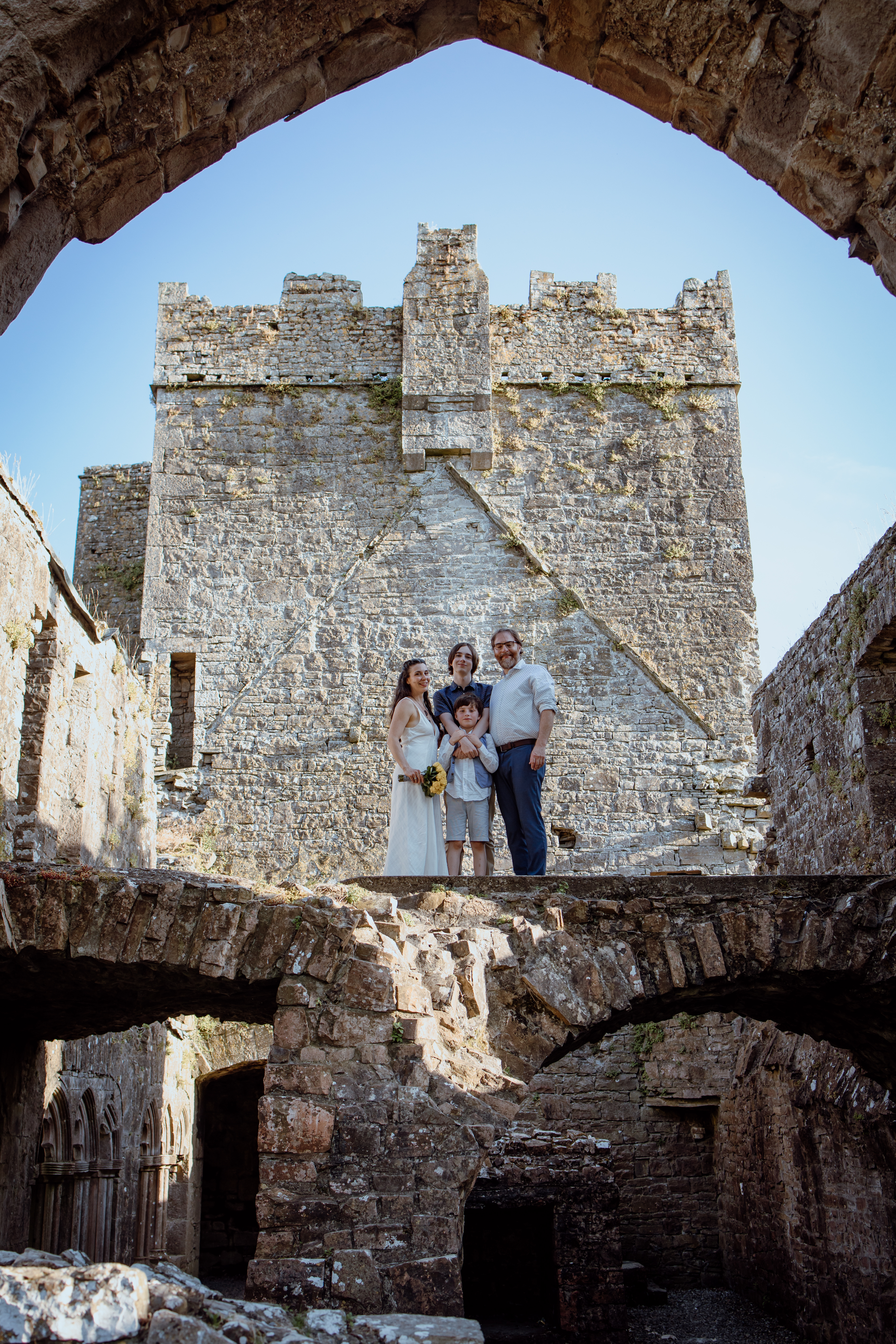 Family celebrating wedding anniversary at Bective Abbey in Ireland 